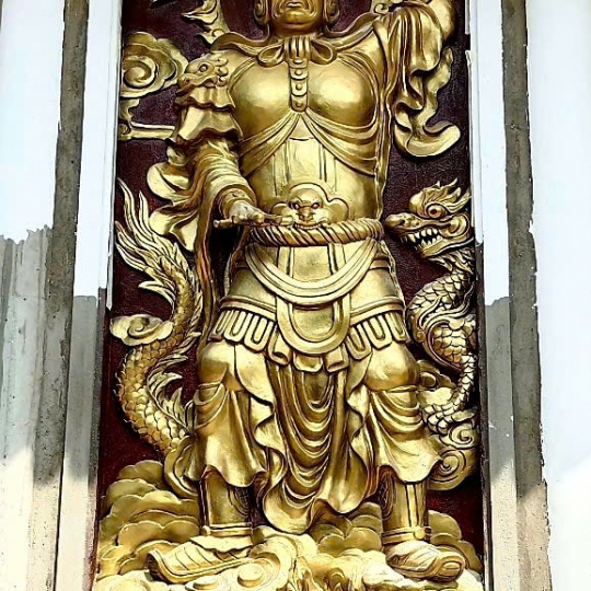 Phù Điêu Tiêu Diện Đại Sĩ Và Vi Đà Hộ Pháp
